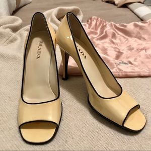 Prada pale yellow heels with black trim
